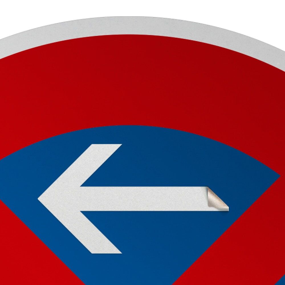 Detail: Pfeil links auf Schild, Ecke abziehbar (Applikation)