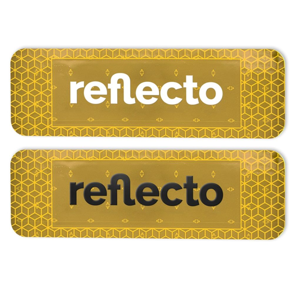 Zwei gelbe VC 104+ Sticker: weißer vs. schwarzer „reflecto“-Schriftzug