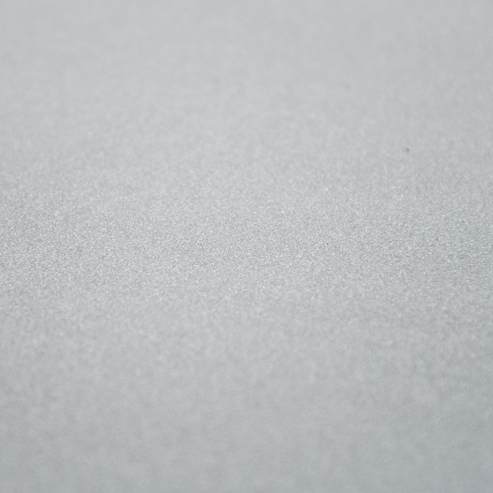 Detail: mikroprismatische Oberfläche der ORALITE Superlens 3000, silbergrau