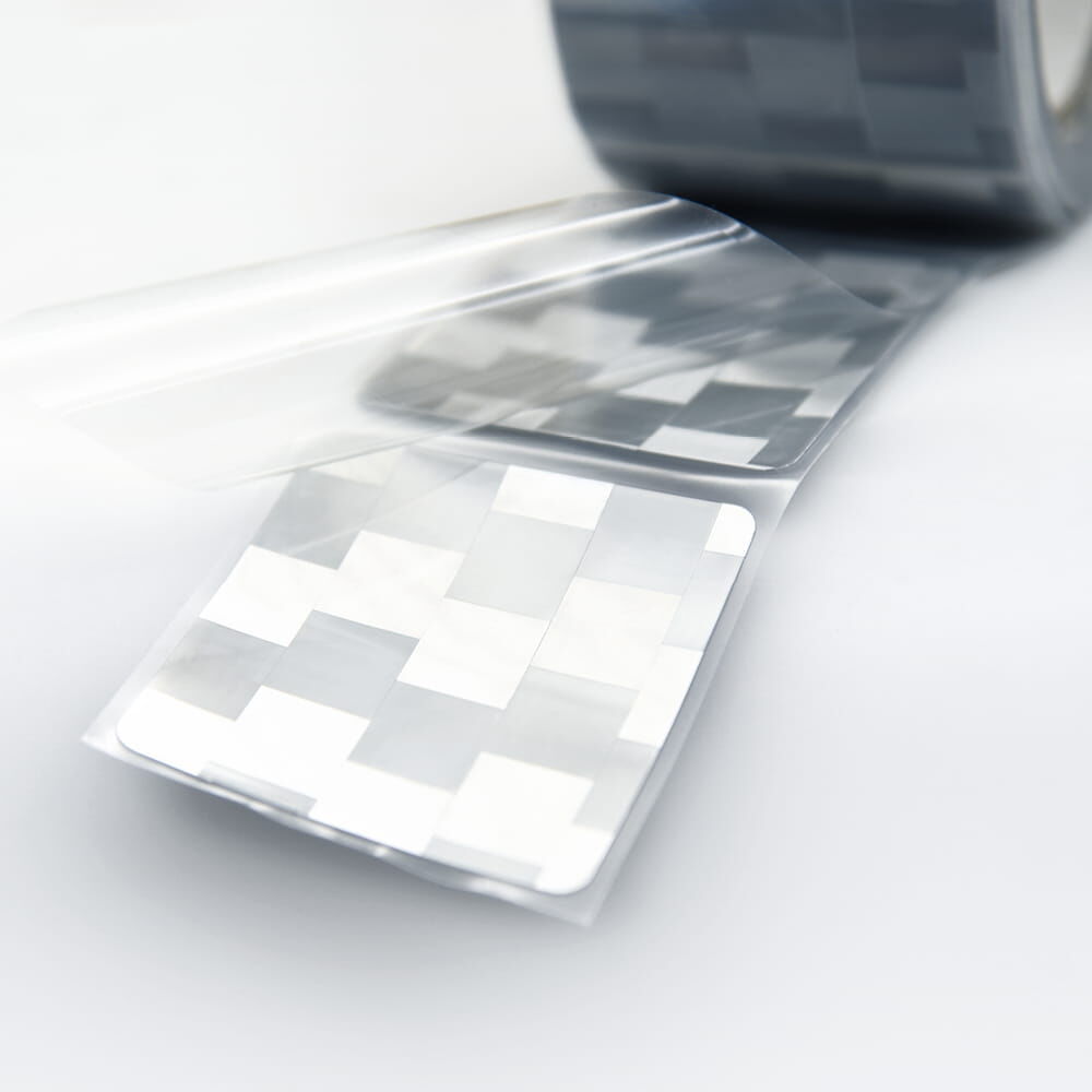 Rückseite reflektierender Konturmarkierungs-Sticker auf Rolle, teilweise abgerollt