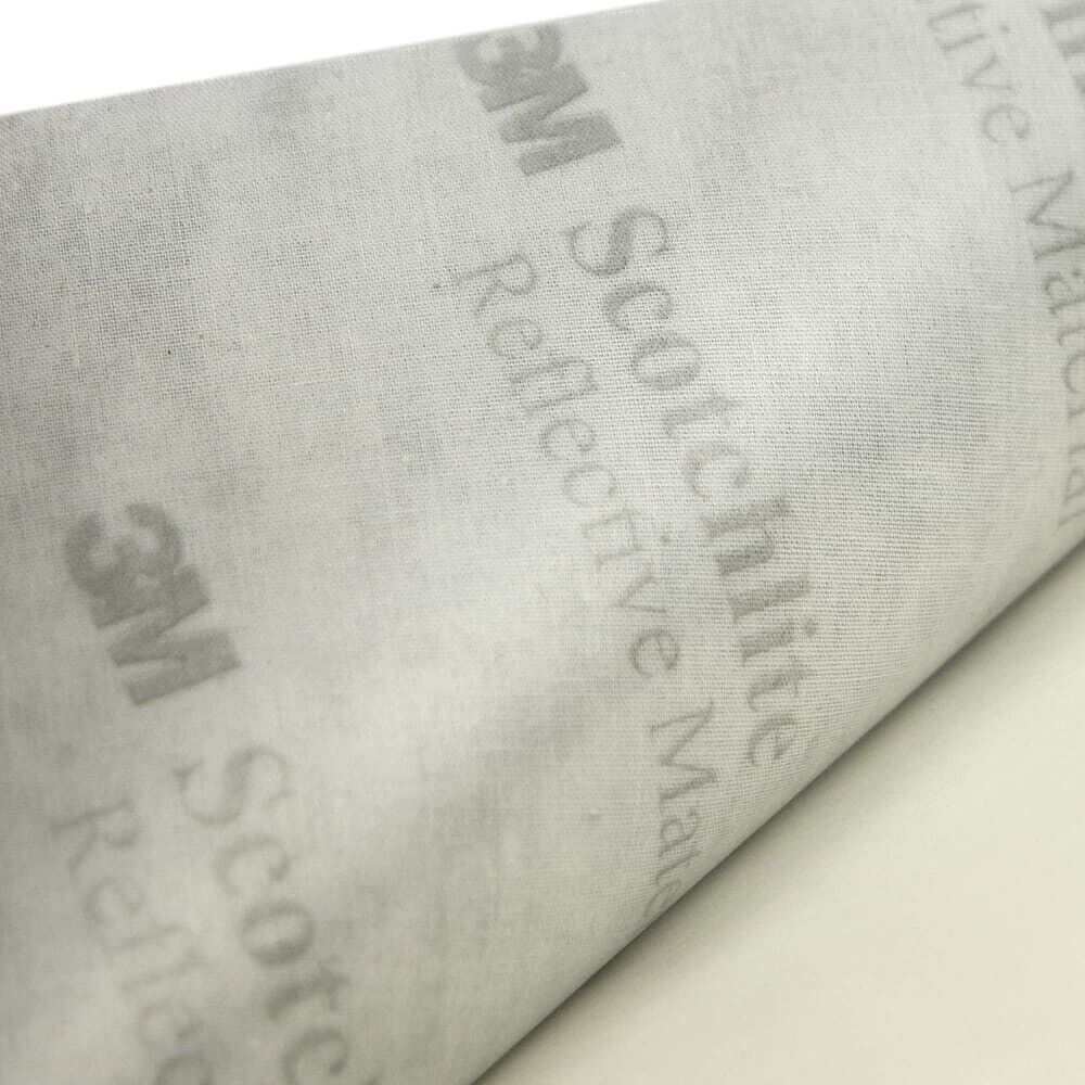 Nahaufnahme Trägerfolie 3M Scotchlite auf Reflecto Reflexgewebe 3011