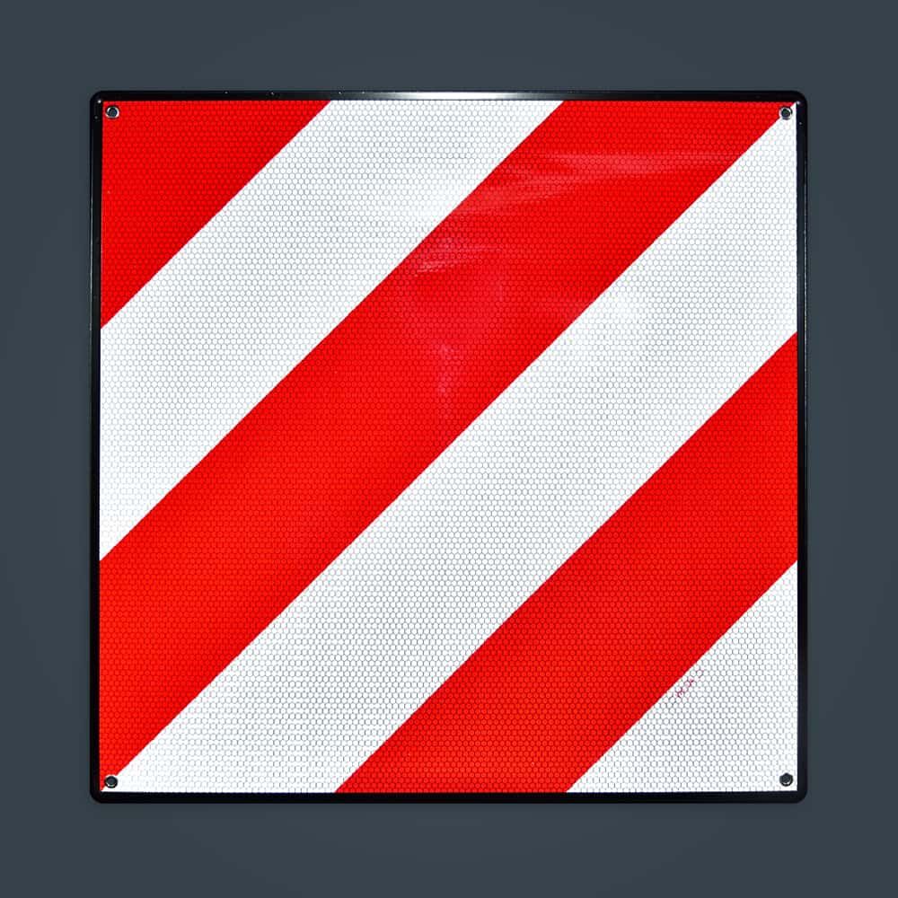 Warntafel Spanien rot-weiß, retroreflektierend, Front auf dunklem Hintergrund