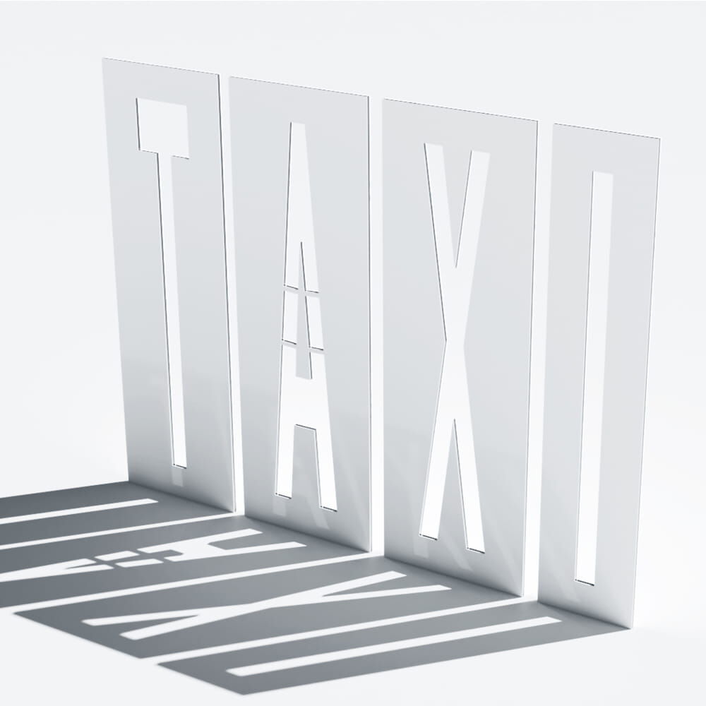 Aufgestellte TAXI-Schablonen, Licht wirft Schrift-Schatten auf den Boden