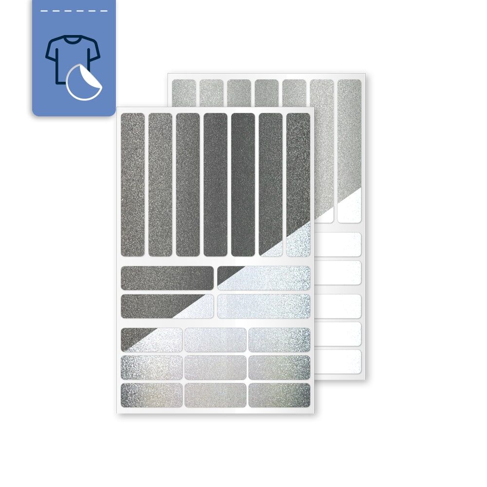 Zwei Bögen Reflexsticker Metallic-Streifen in Schwarz und Silber, Symbol für Textilverklebung.