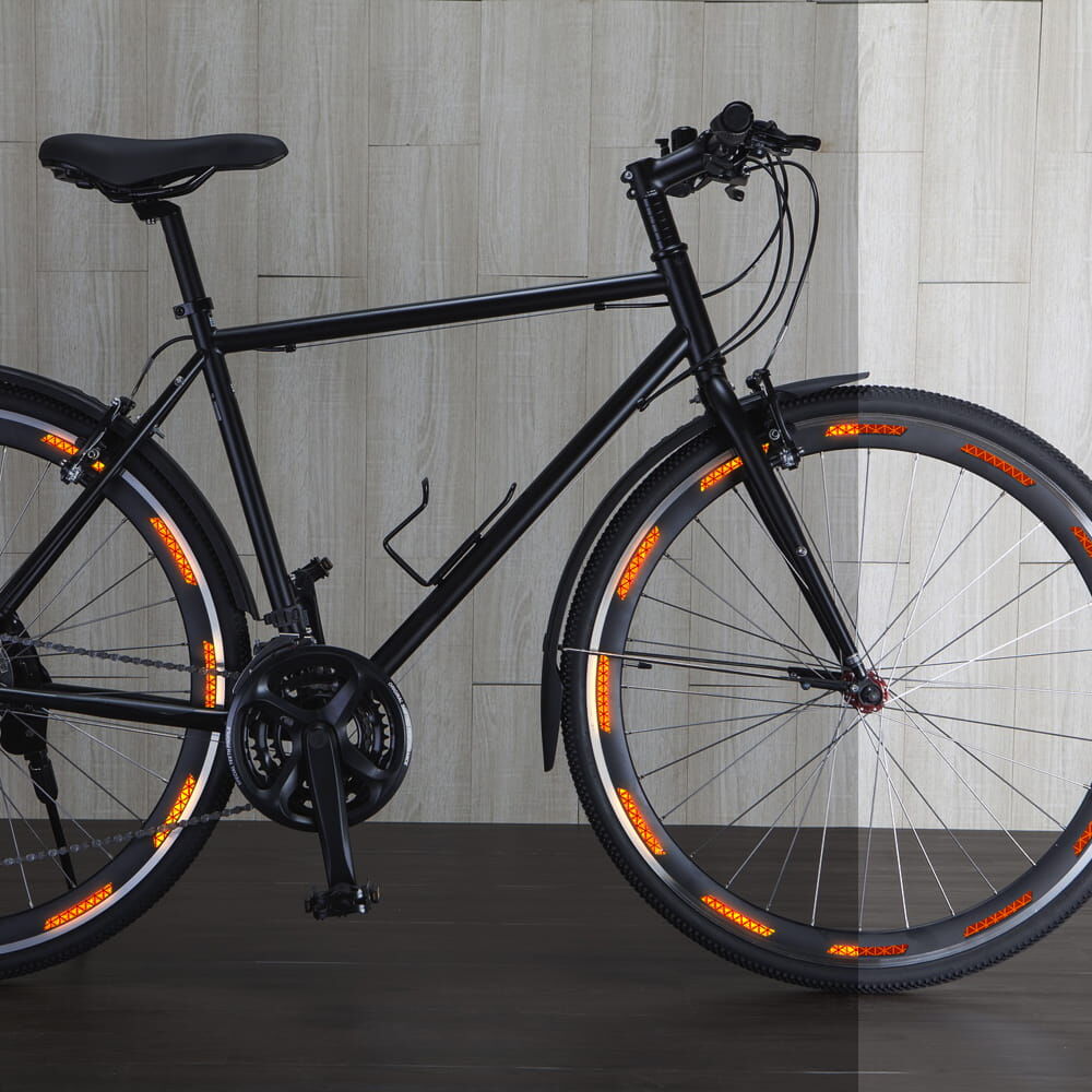 Fahrrad mit Fluor-Orange Felgenstickern an Vorder- und Hinterrad