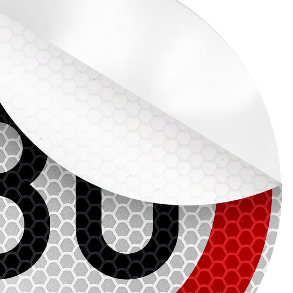 Detailansicht reflektierende Wabenstruktur unter abgelöster Folienecke