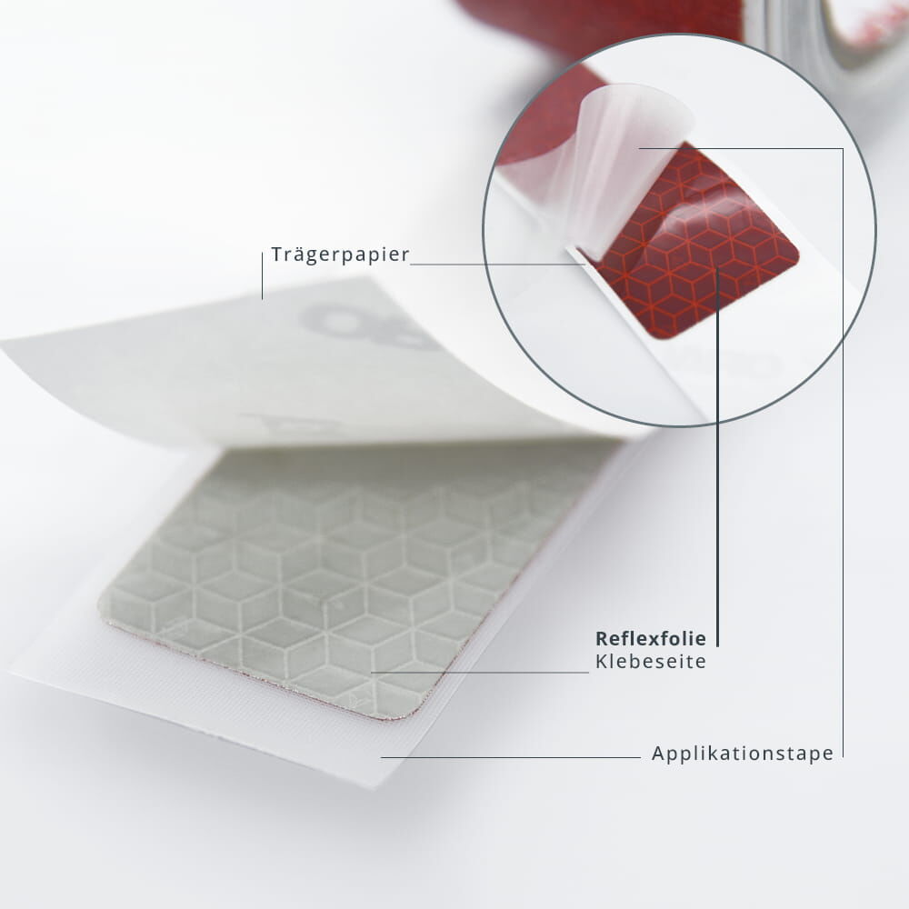 Rückseite eines roten VC170-Gaps mit Wabenstruktur wird vom Trägerpapier gelöst