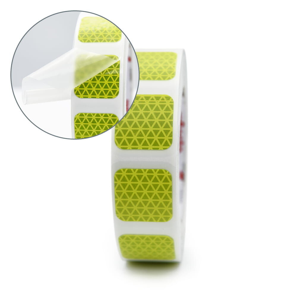 Rolle Orafol VC612 in fluorlime mit Detailansicht von abziehbaren Applikationstape