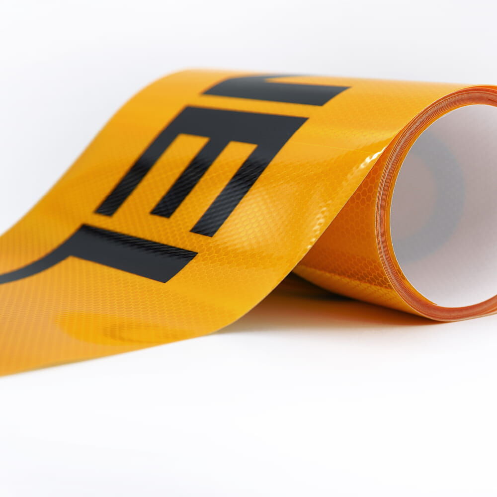 Selbstklebende Folie "CONVOI EXCEPTIONNEL" auf Rolle, schwarz-orange, RA2/C