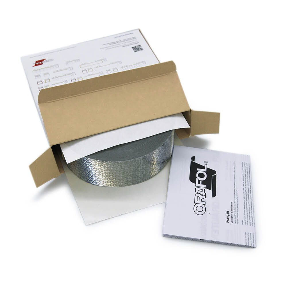 Geöffnete Orafol Box mit weißem VC 104+ CG Band und beiliegender Anleitung