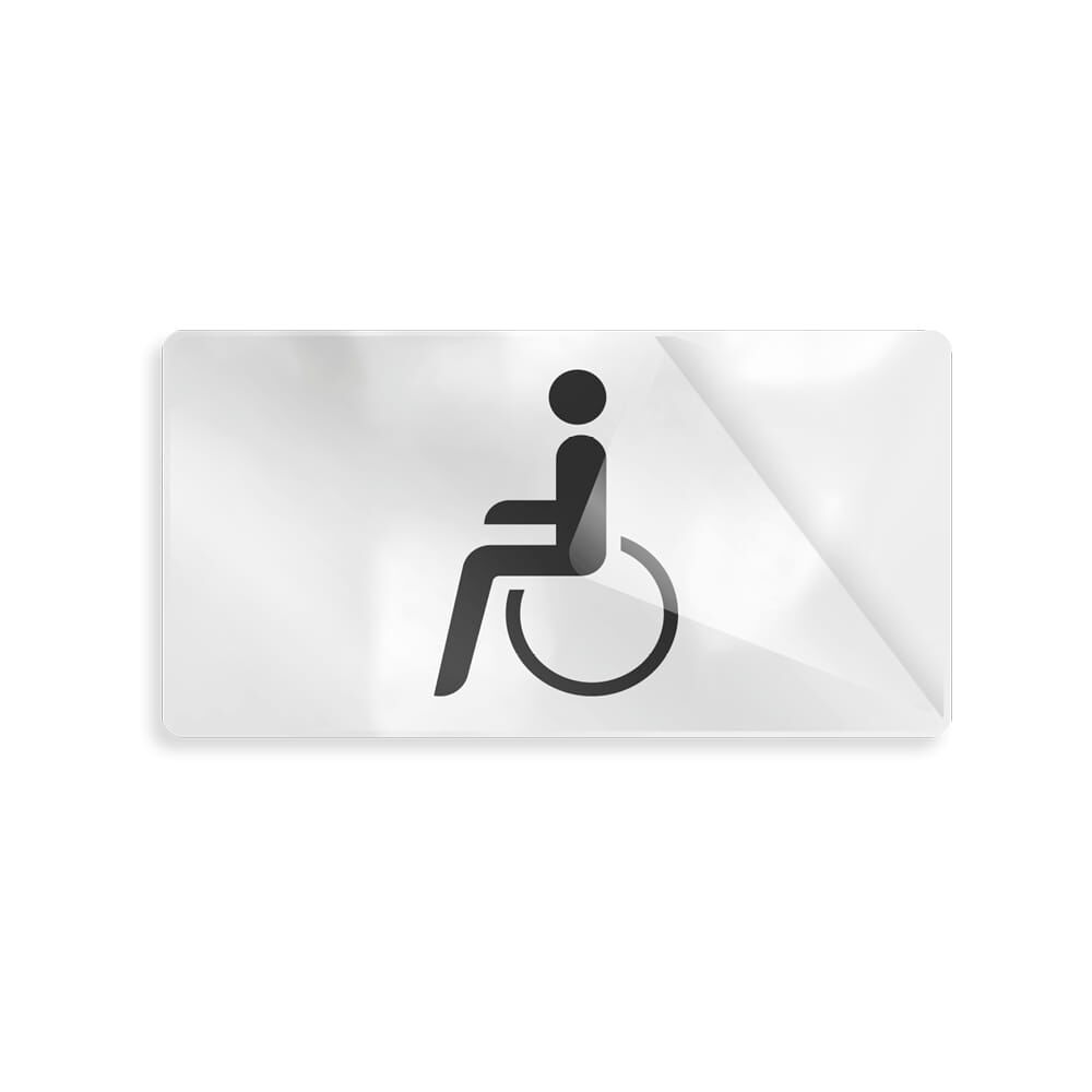 Overlay mit Rollstuhl-Piktogramm aus ablösbarer Folie mit Abziehecke