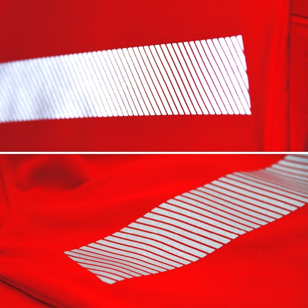 Roter Stoff mit aufpresstem 5510 M-Segmentband, schräge Reflexlinien.