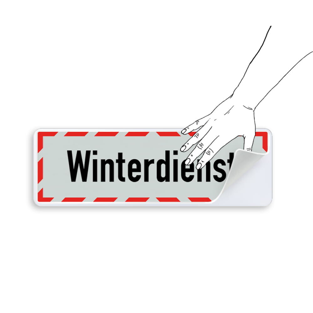 Hand platziert Winterdienst-Schild auf Aufbewahrungsträger 500 × 150 mm, selbsthaftend