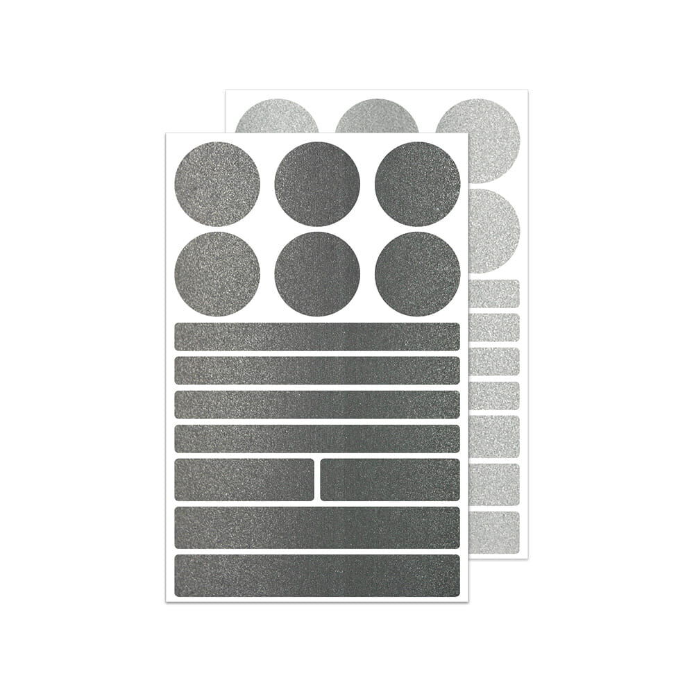 Stickerbogen mit runden & länglichen Metallic-Reflexformen in Silber und Schwarz