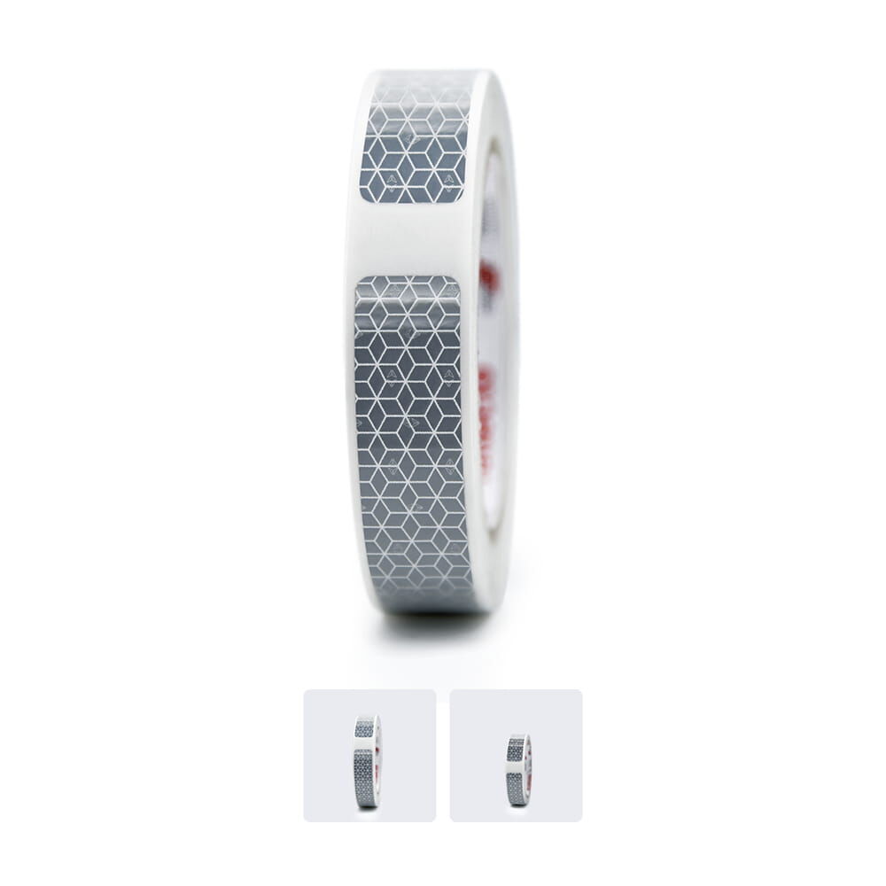 Rolle mit grauen, rechteckigen Konturmarkierungssegmenten im Wabenmuster auf weißem Trägerband