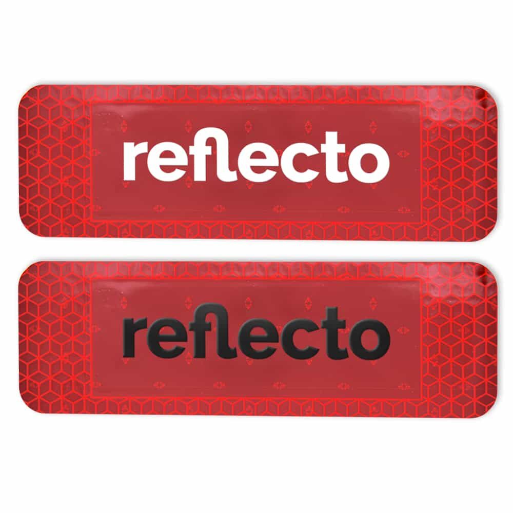 Zwei rote VC 104+ Sticker: weißer vs. schwarzer „reflecto“-Schriftzug