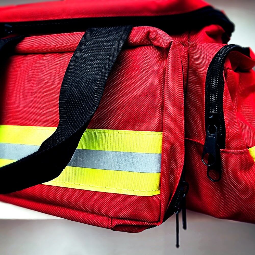 Rote Einsatztasche mit horizontalem gelb-silbernen 3M 9687 Reflexstreifen