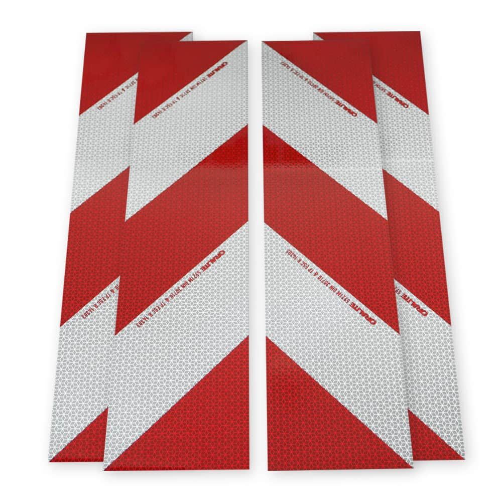 Vier Orafol 5921M Zuschnitte, 564 × 141 mm, diagonal geteilt rot-weiß, Vorderseite.
