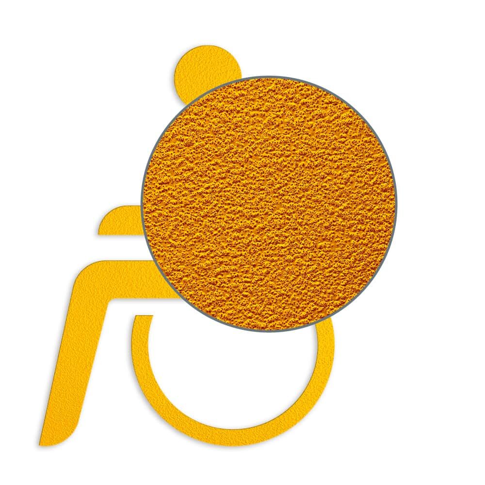Detailansicht strukturierte Oberfläche des gelben Rollstuhlsymbols für Markierungen
