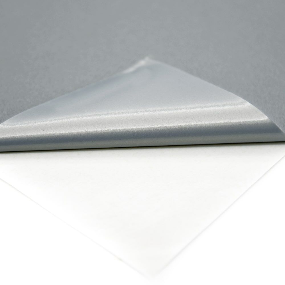 Detail: ORALITE Superlens 3000 Folie wird von Trägerpapier abgezogen